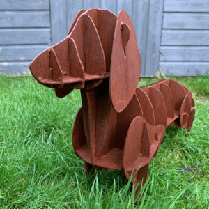 rusted dachshund sculpture